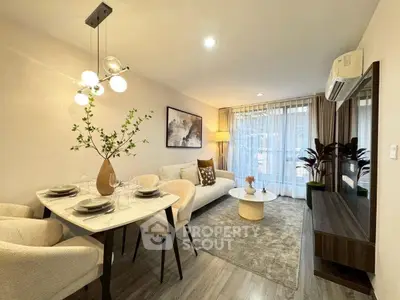 Modern living room with elegant dining area and stylish decor