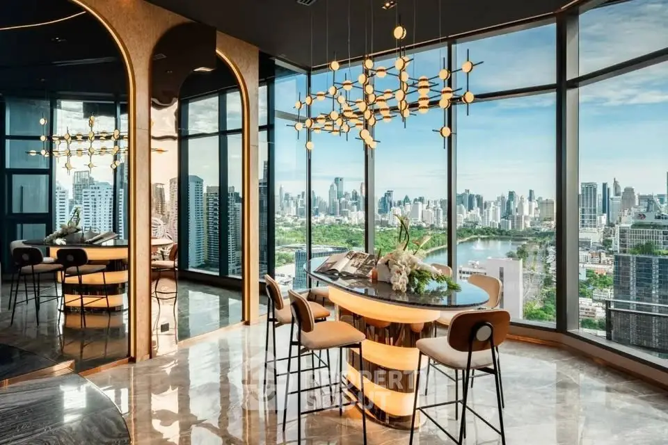 Luxurious high-rise apartment with panoramic city views and elegant modern interior design.