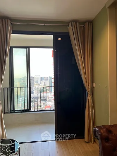 Stylish apartment with city view and elegant curtains