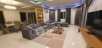 Spacious modern living room with elegant decor and dining area