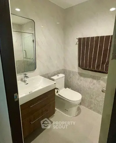 Modern bathroom with sleek fixtures and elegant tile design