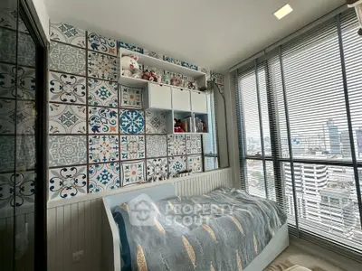 Charming bedroom with patterned wall tiles and city view, featuring cozy bed and modern blinds.