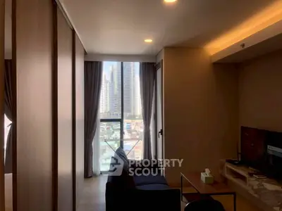 Modern living room with city view and cozy seating area