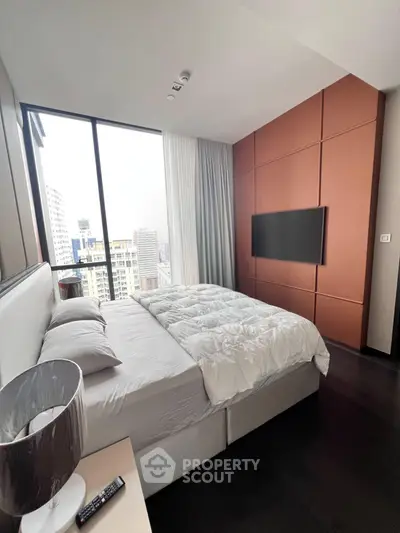 Luxurious modern bedroom with city view and stylish decor