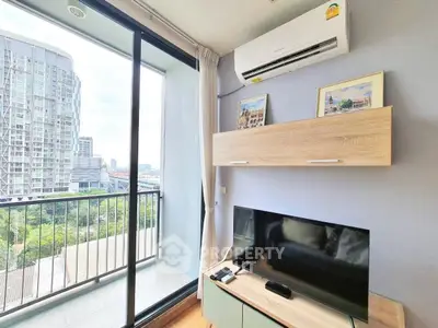 Modern living room with balcony view in high-rise apartment