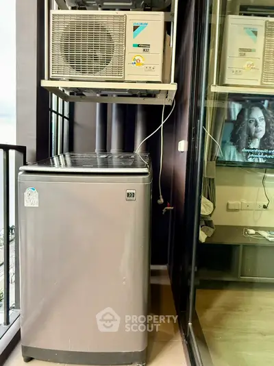 Compact balcony with washing machine and air conditioning units