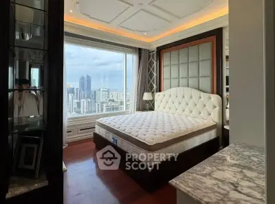 Luxurious bedroom with stunning city view and elegant decor