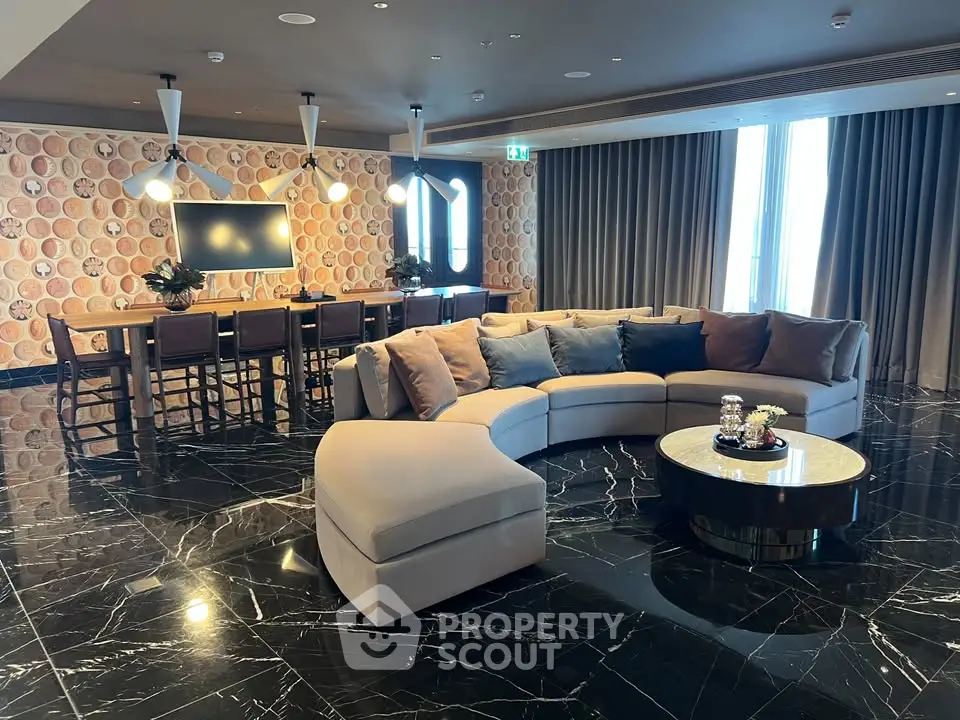 Luxurious living room with elegant marble flooring and modern decor