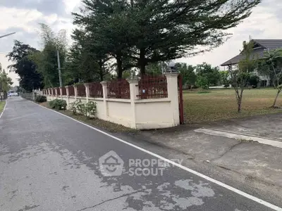 Charming suburban property with spacious yard and mature trees, perfect for family living.