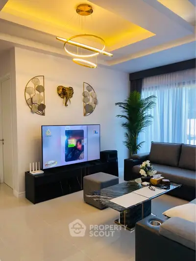 Modern living room with stylish decor and elegant lighting