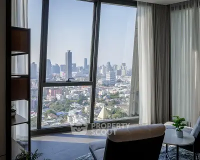 Luxurious high-rise apartment with stunning city view from the living room, featuring modern decor and large windows.