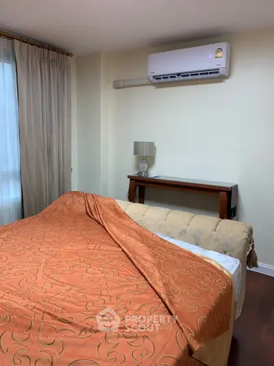 Cozy bedroom with air conditioning and elegant decor