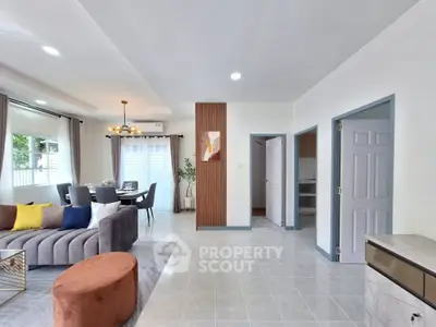 Spacious modern living room with stylish decor and dining area