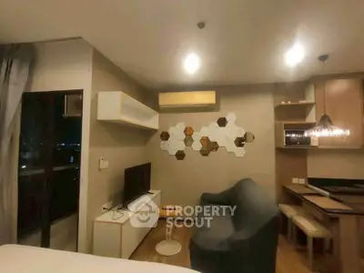 Modern living room with stylish decor and open kitchen layout