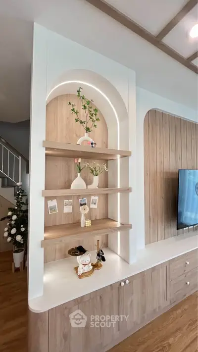 Stylish living room with modern wooden shelving and decorative accents