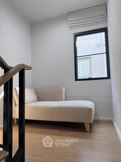 Cozy modern living space with natural light and minimalist design