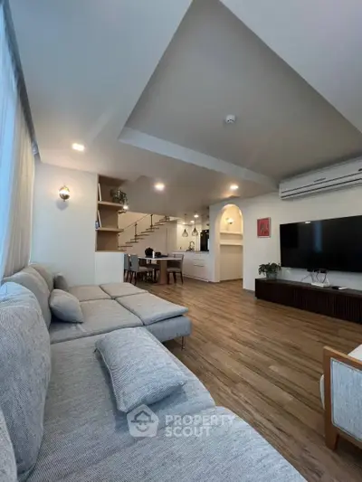 Spacious modern living room with stylish decor and open layout
