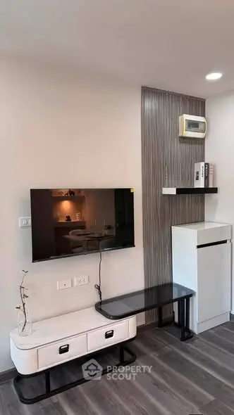 Modern living room with sleek TV setup and stylish decor