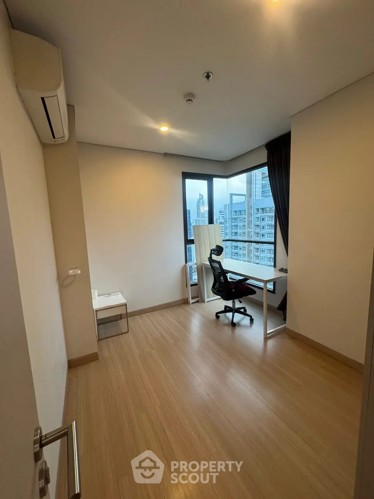 Modern study room with city view and sleek furniture