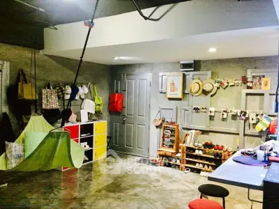 Stylish urban living room with industrial design and creative storage solutions.