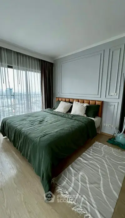 Luxurious bedroom with panoramic city view and elegant decor