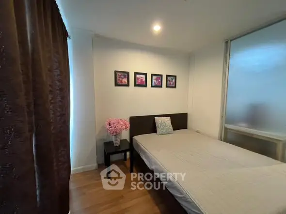 Cozy bedroom with elegant decor and soft lighting, perfect for relaxation.