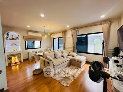 Spacious living room with cozy sectional sofa and elegant decor