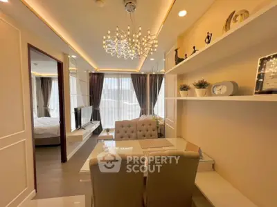 Luxurious modern living room with elegant chandelier and stylish decor