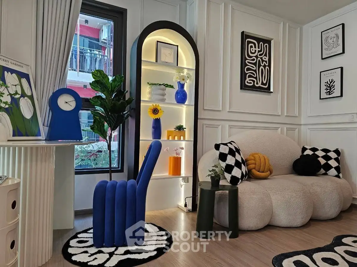 Stylish modern living room with unique furniture and artistic decor