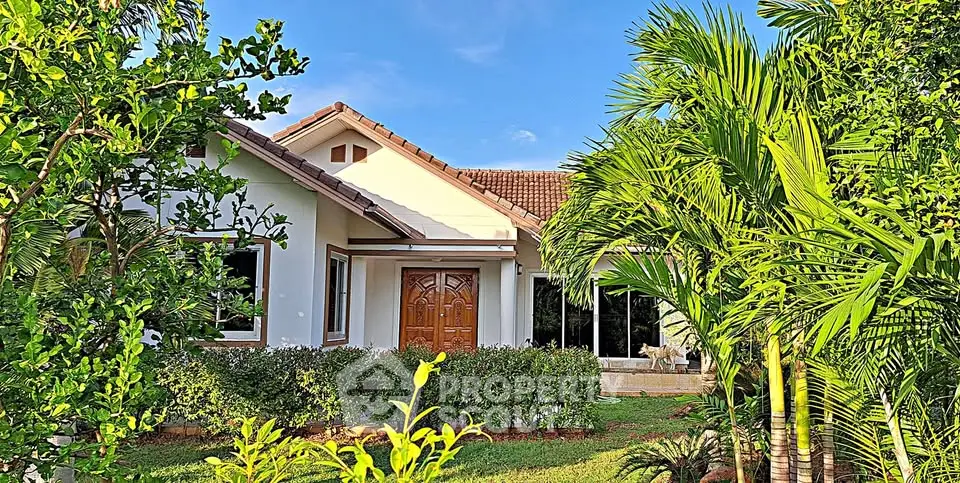 Charming single-story home with lush garden and inviting entrance