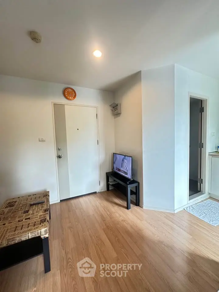 Cozy living room with wooden flooring and modern decor