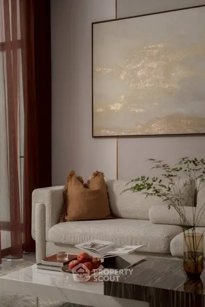 Elegant living room with modern sofa, abstract art, and stylish decor