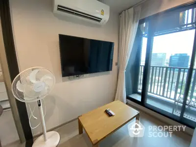 Modern living room with air conditioning and balcony view in urban apartment