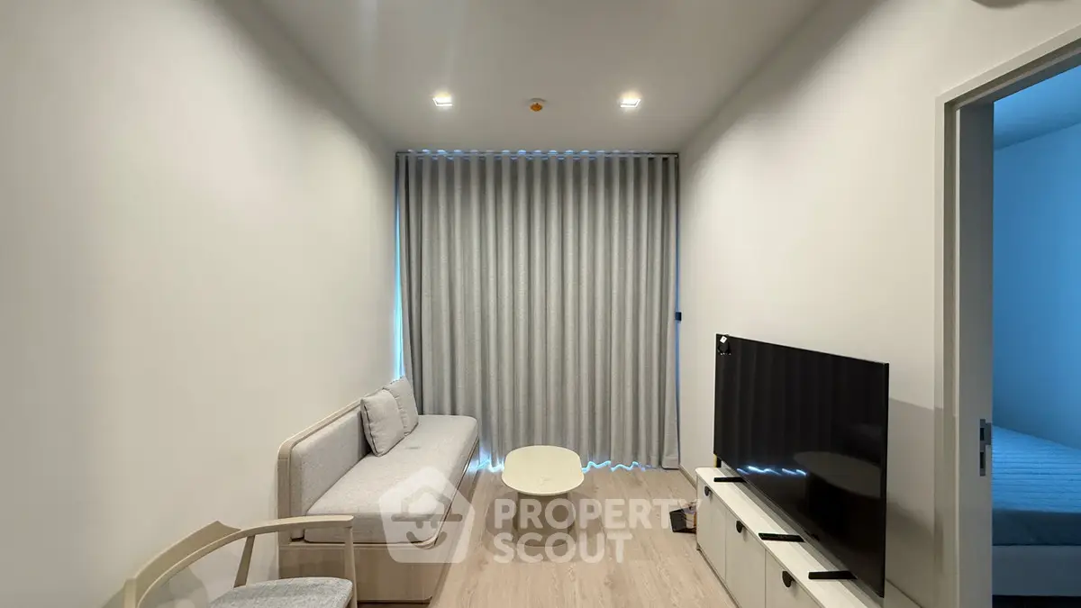 Modern living room with minimalist decor and natural light