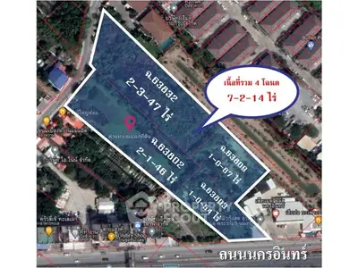 Prime land plot with clear boundaries and location markers in a vibrant area.