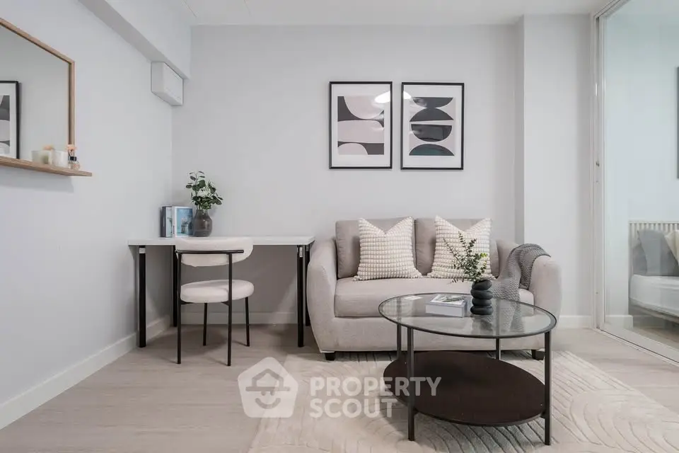 Modern living room with stylish decor and cozy seating area, perfect for relaxation and entertaining.