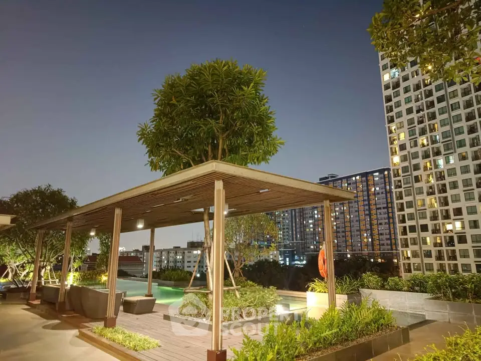 Luxurious rooftop garden with pool and city view in modern high-rise building.