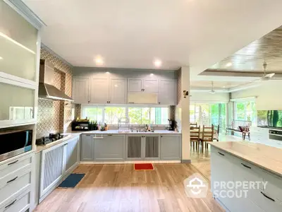 Spacious modern kitchen with open layout and elegant cabinetry