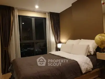 Cozy bedroom with large window and elegant brown curtains