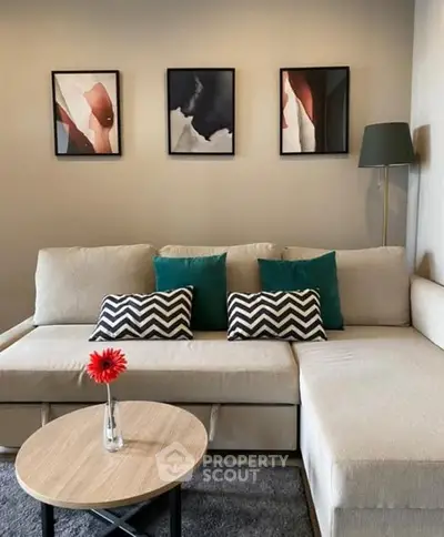 Stylish living room with modern decor and cozy beige sofa