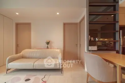 Modern living room with stylish furniture and open layout, perfect for cozy gatherings.