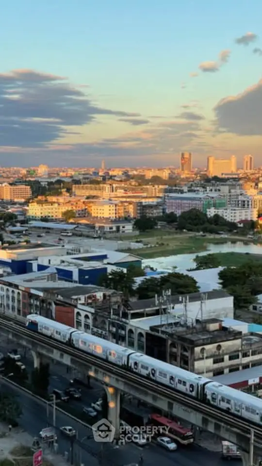 Stunning cityscape view with skyline and train, perfect for urban living enthusiasts.