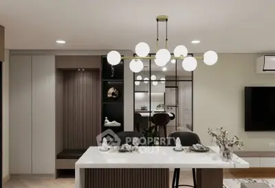 Modern dining area with elegant lighting and stylish decor in a contemporary home.