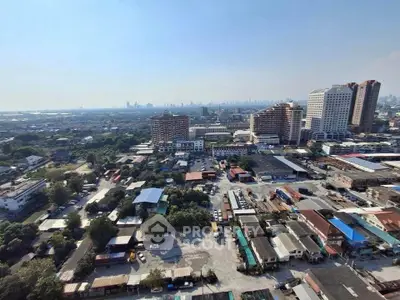 Stunning aerial view of urban landscape with high-rise buildings and sprawling cityscape.