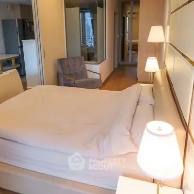 Spacious modern bedroom with elegant decor and cozy lighting