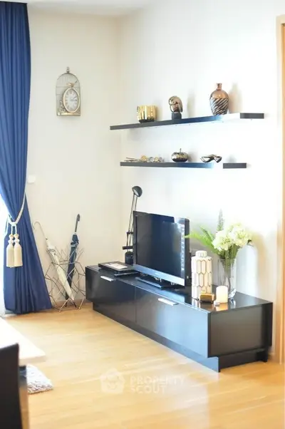 Stylish living room with modern decor and sleek entertainment unit