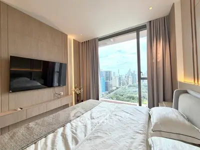 Luxurious bedroom with stunning city view and modern decor