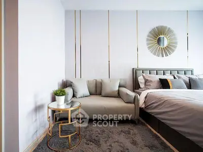 Modern bedroom with stylish decor and cozy seating area
