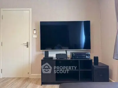 Modern living room with sleek TV setup and stylish decor