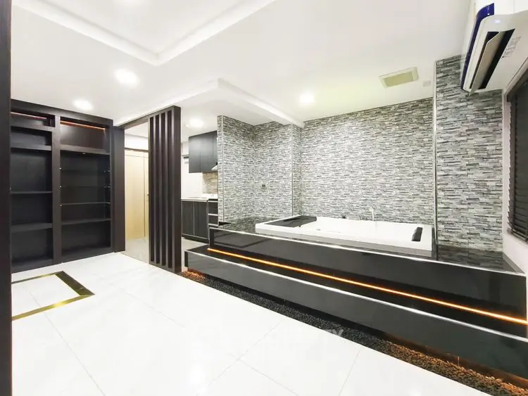 Luxurious modern bathroom with sleek design and built-in bathtub
